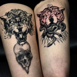 Wolves, skull & snake thigh tattoo.  Golden Iron Tattoo Studio is located on 363 Spadina Ave Toronto ON, M5T 2G3. For inquires on booking an appointment please contact (416)-903-1624 during opening hours 11:00AM-7:00PM 