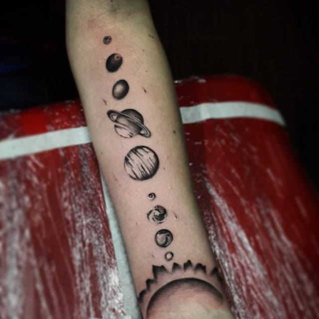 A solar system theme tattoo done by Kristian  Golden Iron Tattoo Studio is located on 363 Spadina Ave Toronto ON, M5T 2G3. For inquires on booking an appointment please contact (416)-903-1624 during opening hours 11:00AM-7:00PM