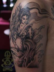 Japanese Geisha tattoo.  Golden Iron Tattoo Studio is located on 363 Spadina Ave Toronto ON, M5T 2G3. For inquires on booking an appointment please contact (416)-903-1624 during opening hours 11:00AM-7:00PM 