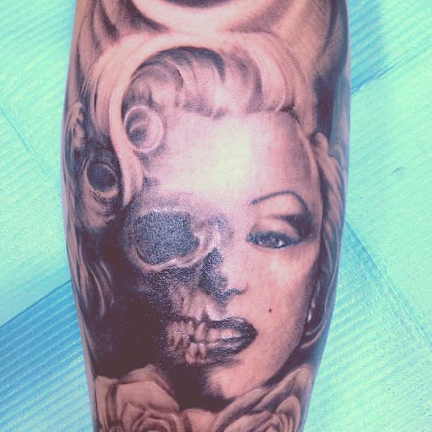Half Marilyn Monroe half Skull Tattoo Golden Iron Tattoo.  Studio is located on 363 Spadina Ave Toronto ON, M5T 2G3. For inquires on booking an appointment please contact (416)-903-1624 during opening hours 11:00AM-7:00PM