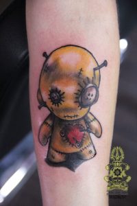 Creepy doll tattoo.  Golden Iron Tattoo Studio is located on 363 Spadina Ave Toronto ON, M5T 2G3. For inquires on booking an appointment please contact (416)-903-1624 during opening hours 11:00AM-8:00PM