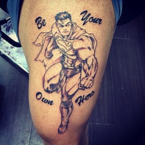 Animated Superman "Be your own hero " tattoo by Cysen. Golden Iron Tattoo Studio is located on 363 Spadina Ave Toronto ON, M5T 2G3. For inquires or to book an appointment please contact (416)-903-1624 during opening hours 11:00AM-8:00PM