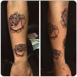 Woodcut roses half sleeve tattoo in progress by Kristian.  Golden Iron Tattoo Studio is located on 363 Spadina Ave Toronto ON, M5T 2G3. For inquires or to book an appointment please contact (416)-903-1624 during opening hours 11:00AM-8:00PM