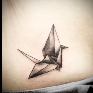 Origami bird tattoo by @wuuuuups For all inquires check us out at http://goldenirontattoostudio.com/