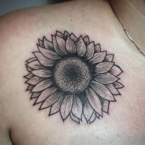 Sun Flower Tattoo Done By Gregory - @unklegregory For all inquires check us out at http://goldenirontattoostudio.com/